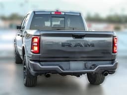 Ram 1500 Laramie 4x4 Crew Cab 5'7" Box 2026 — side view