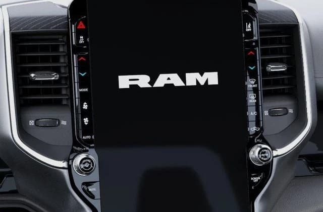 Ram 1500 Laramie 4x4 Crew Cab 5'7" Box 2026 — side view