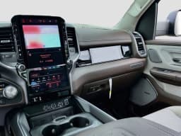 Ram 1500 Laramie 4x4 Crew Cab 5'7" Box 2026 — side view
