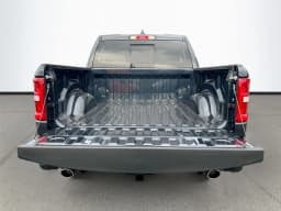 Ram 1500 Laramie 4x4 Crew Cab 5'7" Box 2026 — side view