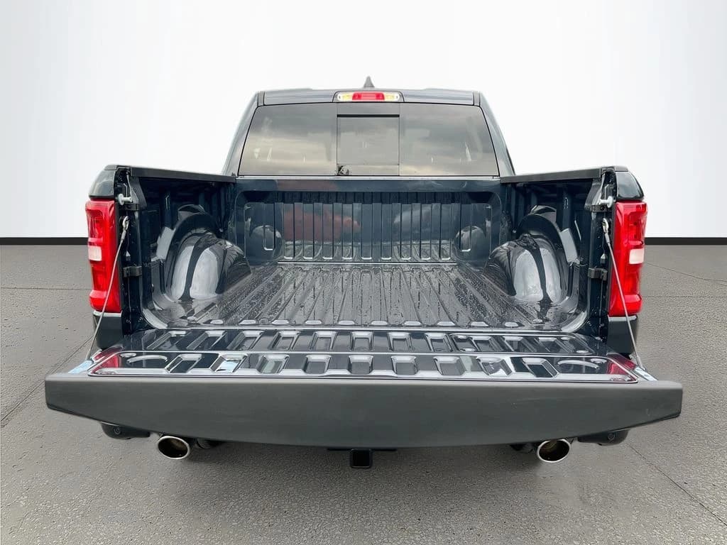 Ram 1500 Laramie 4x4 Crew Cab 5'7" Box 2026 — side view