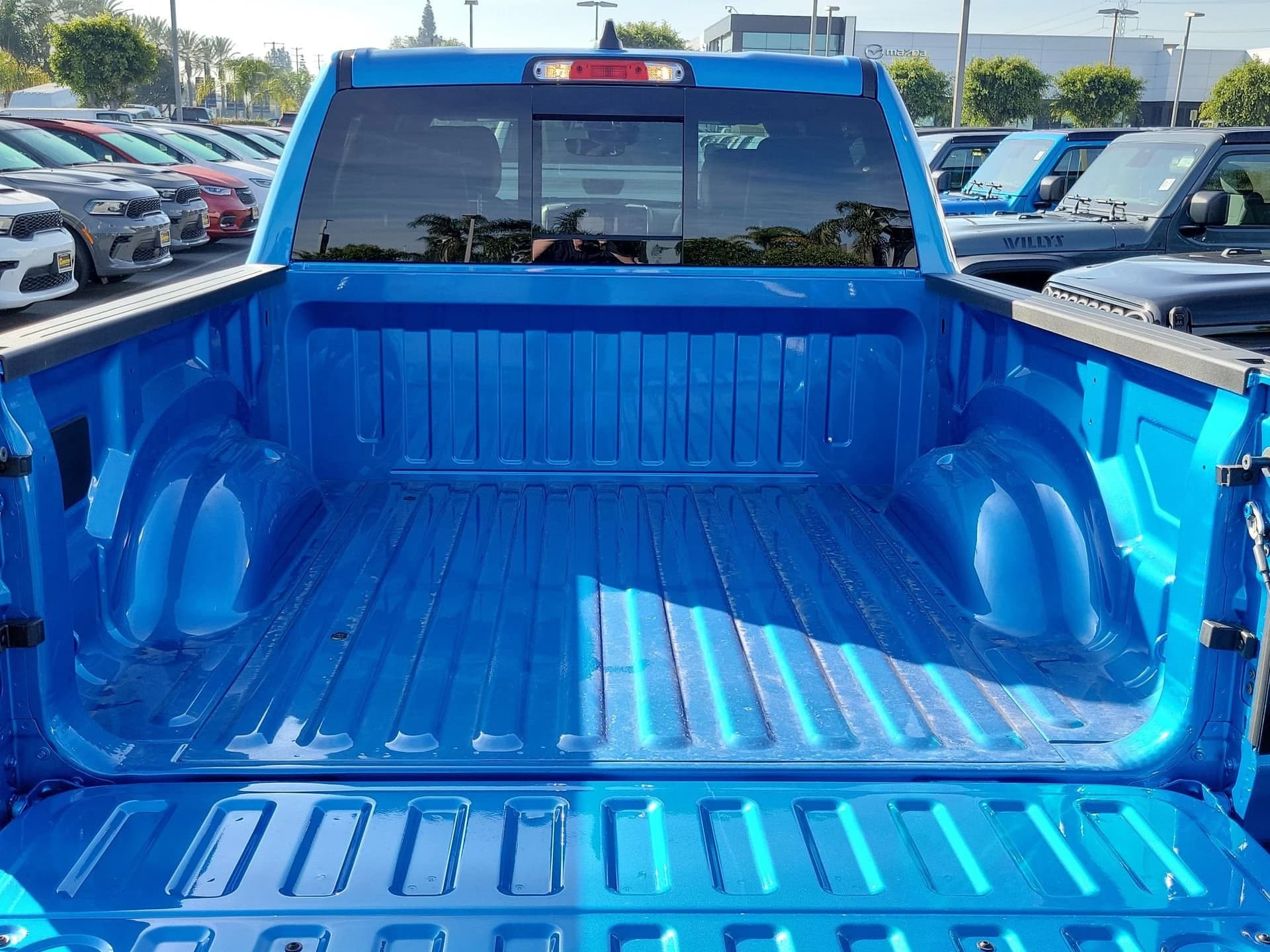 Ram 1500 Laramie 4x4 Crew Cab 5'7" Box 2026 — side view