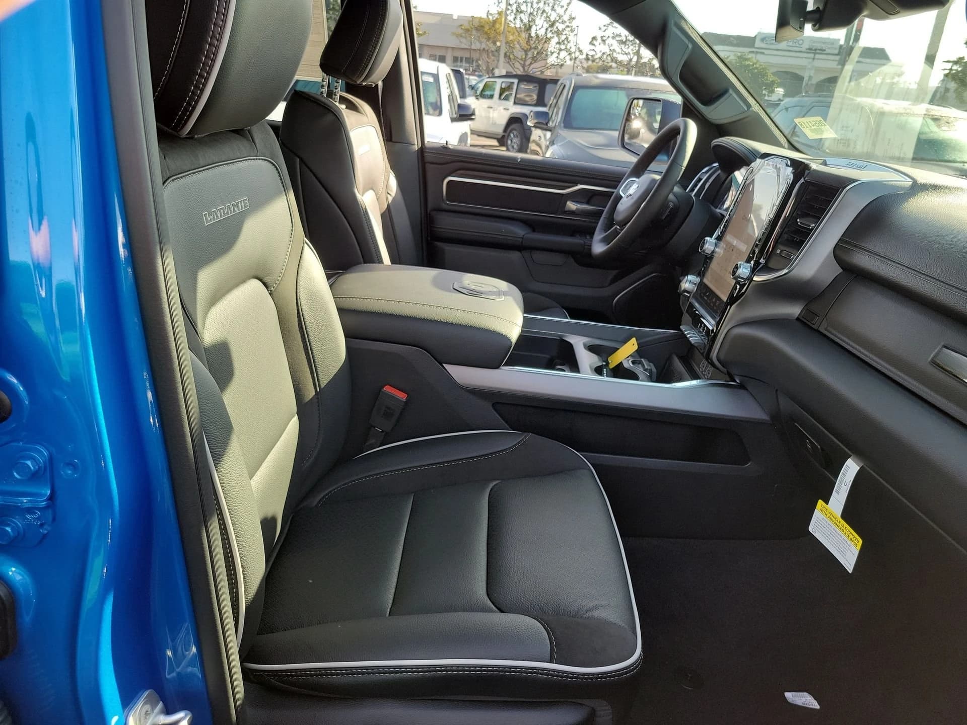 Ram 1500 Laramie 4x4 Crew Cab 5'7" Box 2026 — side view
