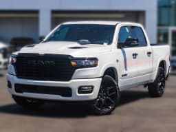 Ram 1500 Laramie 4x4 Crew Cab 5'7" Box 2026 — side view