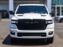 Ram 1500 Laramie 4x4 Crew Cab 5'7" Box 2026 — side view