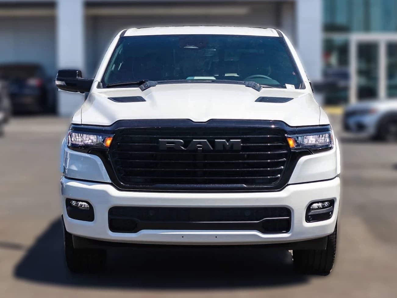 Ram 1500 Laramie 4x4 Crew Cab 5'7" Box 2026 — side view