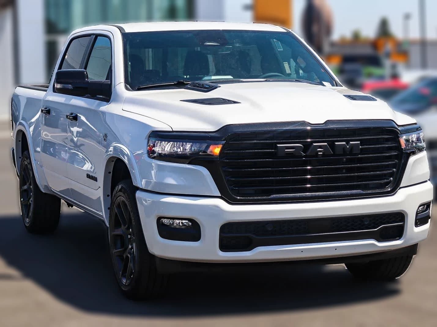 Ram 1500 Laramie 4x4 Crew Cab 5'7" Box 2026 — side view