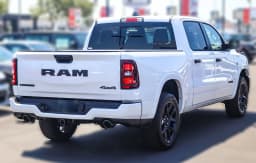 Ram 1500 Laramie 4x4 Crew Cab 5'7" Box 2026 — side view