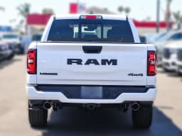 Ram 1500 Laramie 4x4 Crew Cab 5'7" Box 2026 — side view