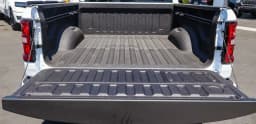 Ram 1500 Laramie 4x4 Crew Cab 5'7" Box 2026 — side view