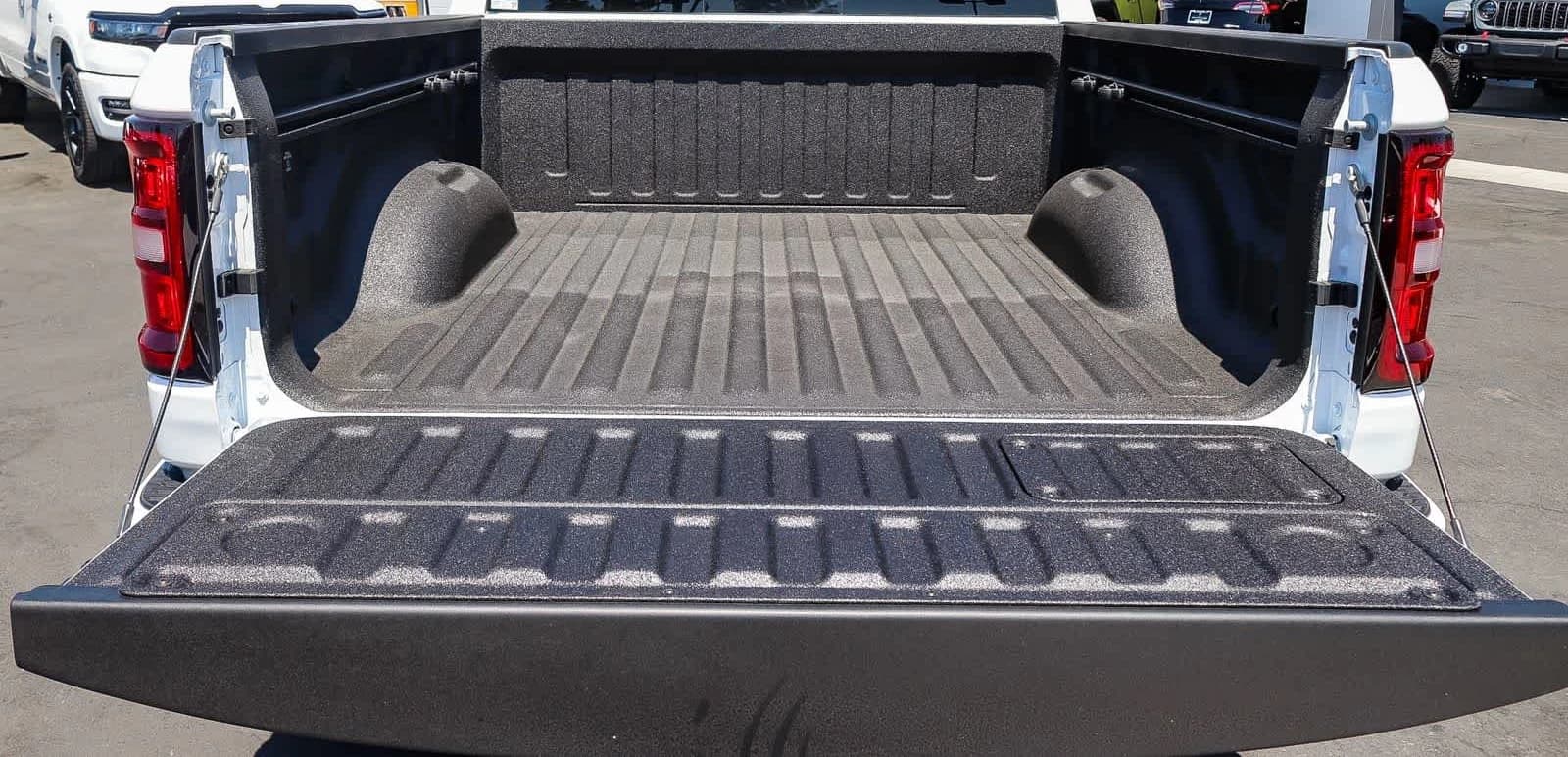 Ram 1500 Laramie 4x4 Crew Cab 5'7" Box 2026 — side view