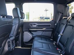 Ram 1500 Laramie 4x4 Crew Cab 5'7" Box 2026 — side view