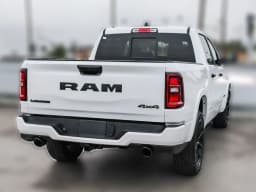 Ram 1500 Laramie 4x4 Crew Cab 5'7" Box 2026 — side view