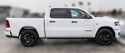 Ram 1500 Laramie 4x4 Crew Cab 5'7" Box 2026 — side view