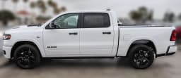 Ram 1500 Laramie 4x4 Crew Cab 5'7" Box 2026 — side view