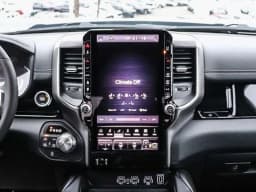 Ram 1500 Laramie 4x4 Crew Cab 5'7" Box 2026 — side view