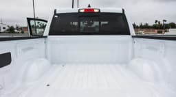 Ram 1500 Laramie 4x4 Crew Cab 5'7" Box 2026 — side view