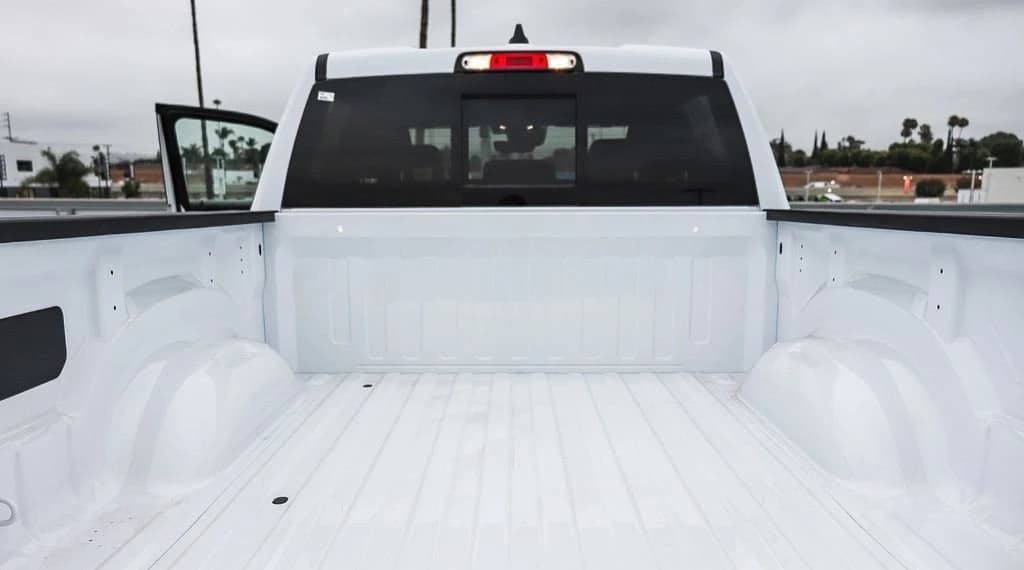 Ram 1500 Laramie 4x4 Crew Cab 5'7" Box 2026 — side view