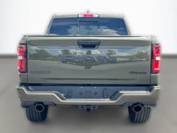 Ram 1500 Laramie 4x4 Crew Cab 5'7" Box 2026 — side view