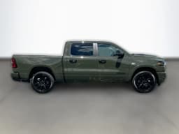 Ram 1500 Laramie 4x4 Crew Cab 5'7" Box 2026 — side view