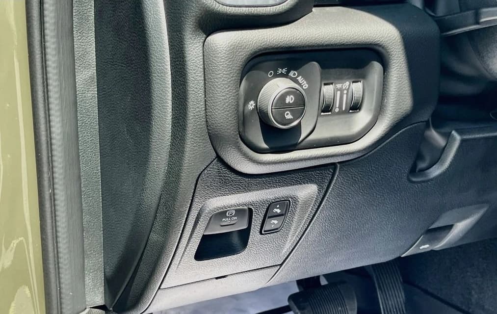 Ram 1500 Laramie 4x4 Crew Cab 5'7" Box 2026 — side view