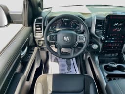 Ram 1500 Laramie 4x4 Crew Cab 5'7" Box 2026 — side view