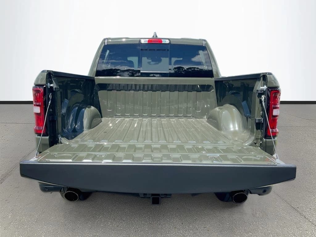 Ram 1500 Laramie 4x4 Crew Cab 5'7" Box 2026 — side view