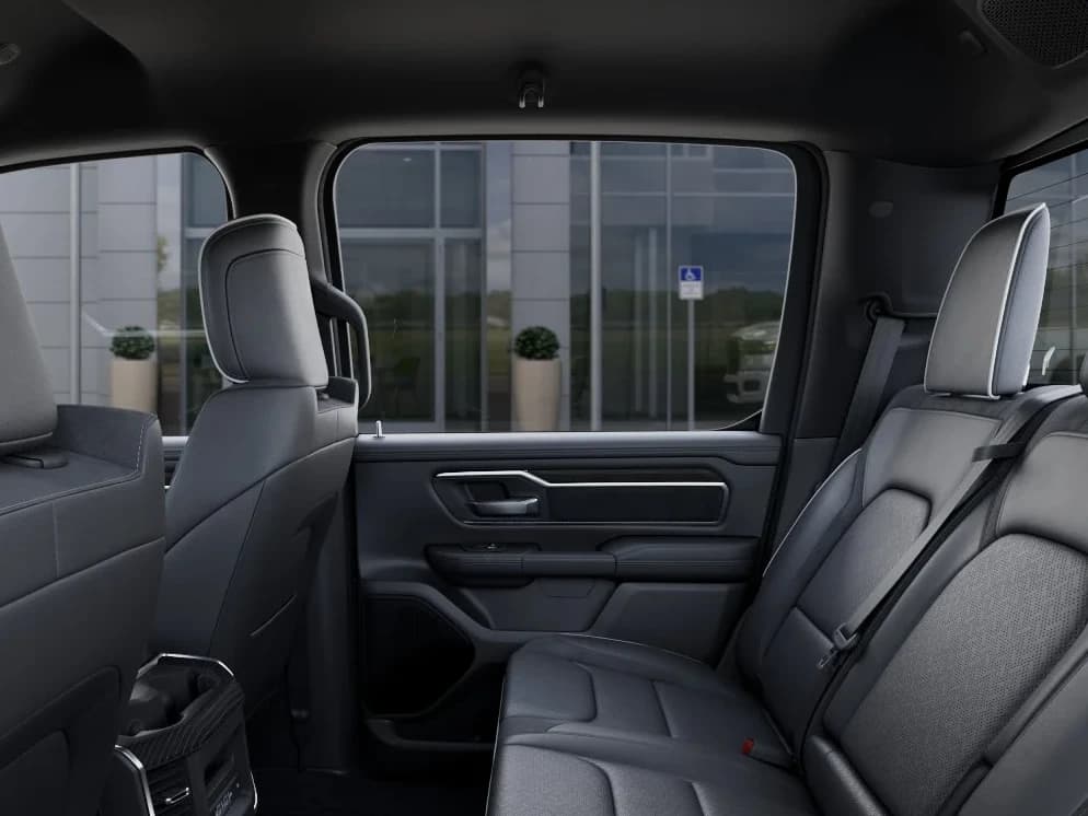 Ram 1500 Laramie 4x4 Crew Cab 5'7" Box 2026 — side view