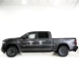 Ram 1500 Laramie 4x4 Crew Cab 5'7" Box 2027 — side view