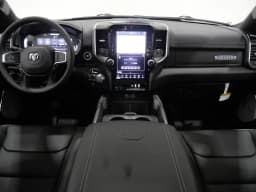 Ram 1500 Laramie 4x4 Crew Cab 5'7" Box 2027 — side view