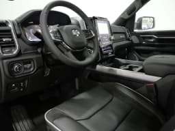 Ram 1500 Laramie 4x4 Crew Cab 5'7" Box 2027 — side view