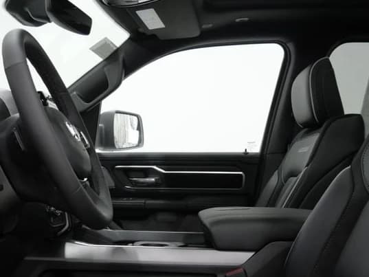 Ram 1500 Laramie 4x4 Crew Cab 5'7" Box 2027 — side view