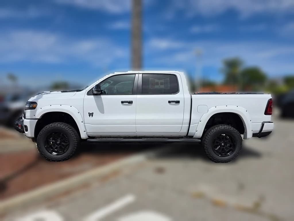 Ram 1500 Laramie 4x4 Crew Cab 5'7" Box 2026 — side view