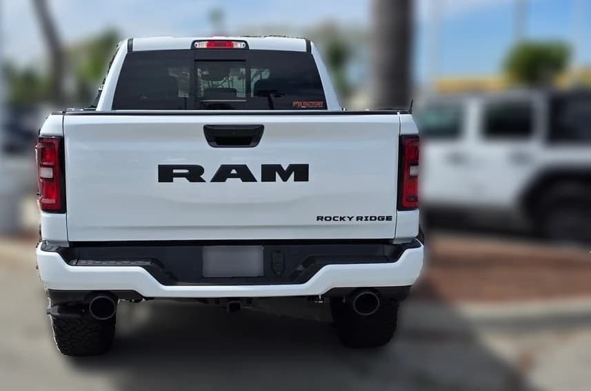 Ram 1500 Laramie 4x4 Crew Cab 5'7" Box 2026 — side view