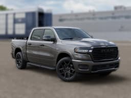 Ram 1500 Laramie 4x4 Crew Cab 5'7" Box 2026 — side view