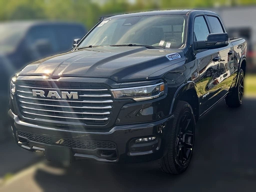 Ram 1500 Laramie 4x4 Crew Cab 5'7" Box 2026 — side view