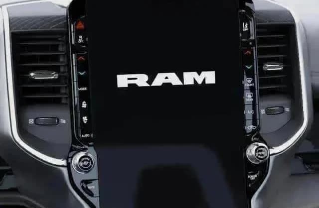 Ram 1500 Laramie 4x4 Crew Cab 5'7" Box 2026 — side view