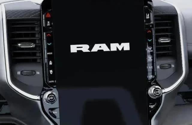 Ram 1500 Laramie 4x4 Crew Cab 5'7" Box 2026 — side view