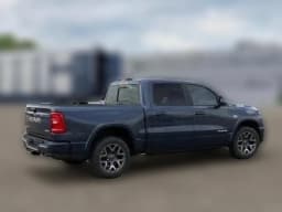Ram 1500 Laramie 4x4 Crew Cab 5'7" Box 2026 — side view