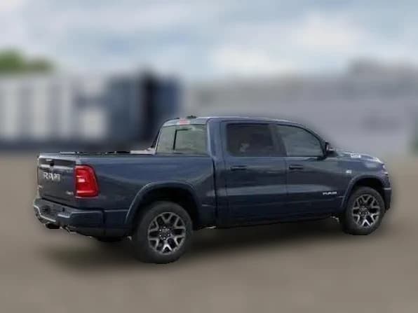 Ram 1500 Laramie 4x4 Crew Cab 5'7" Box 2026 — side view