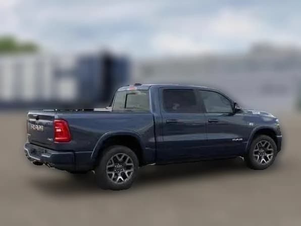 Ram 1500 Laramie 4x4 Crew Cab 5'7" Box 2026 — side view