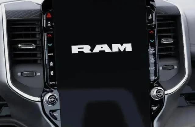 Ram 1500 Laramie 4x4 Crew Cab 5'7" Box 2026 — side view