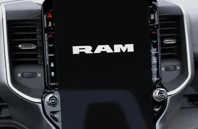 Ram 1500 Laramie 4x4 Crew Cab 5'7" Box 2026 — side view