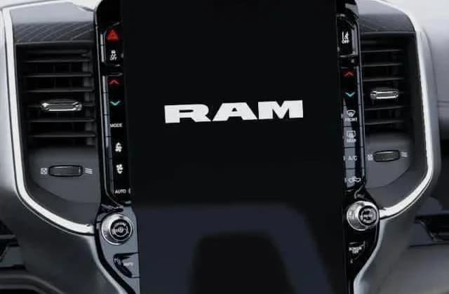 Ram 1500 Laramie 4x4 Crew Cab 5'7" Box 2026 — side view