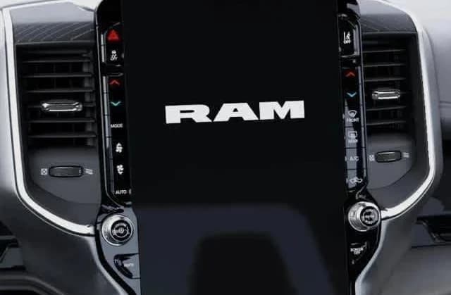 Ram 1500 Laramie 4x4 Crew Cab 5'7" Box 2026 — side view