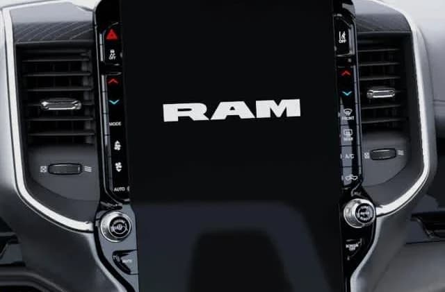 Ram 1500 Laramie 4x4 Crew Cab 5'7" Box 2026 — side view