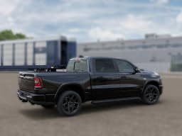 Ram 1500 Laramie 4x4 Crew Cab 5'7" Box 2026 — side view