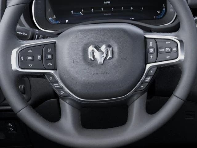 Ram 1500 Laramie 4x4 Crew Cab 5'7" Box 2026 — side view