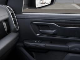 Ram 1500 Laramie 4x4 Crew Cab 5'7" Box 2026 — side view