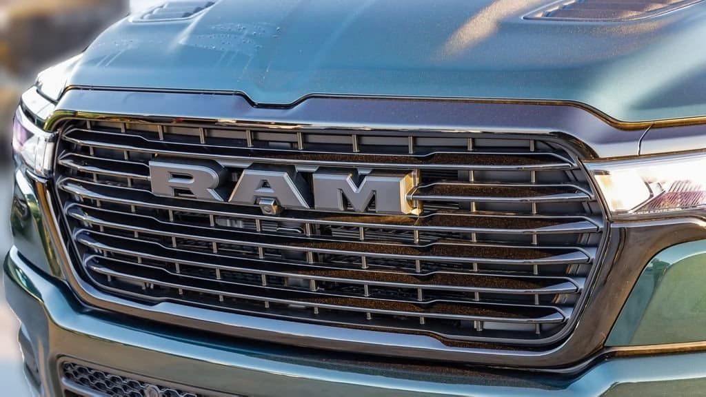 Ram 1500 Laramie 4x4 Crew Cab 5'7" Box 2026 — side view